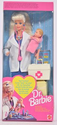 Poupée Barbie « Docteur » avec une petite poupée dans un coffret rose