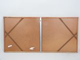 a picture of a cork board with a piece of paper attached to it