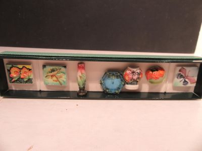 an image of a display case with a variety of miniature figurines in it