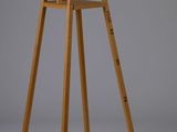 an image of a wooden chair sitting on top of a white floor