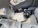 a picture of the inside of a car with the seats down
