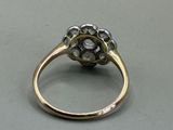an image of a diamond ring on a table