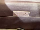 a close up of a purse with a tag on it