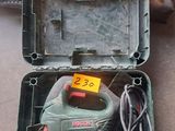a box with tools in it sitting on the floor