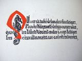 a drawing on the wall of a building with a question mark on it