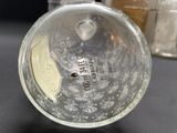 a close up of a glass object on a table