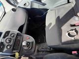 a picture of a car dashboard with a steering control