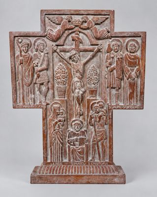 an old wooden cross with a group of people on it