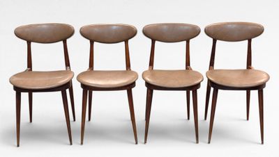 four chairs with wooden legs and a leather seat on a white background