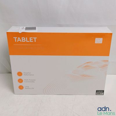 an orange and white box of a tablet on a white surface