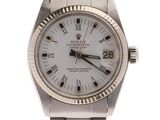 an image of a wrist watch with roman numerals on the dial