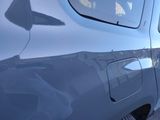 a close up of a car ' s door handle and door handle