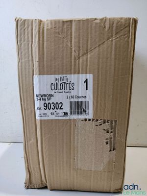 a cardboard box with a price label on it