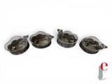 three small glass bowls with spoons in them on a white surface