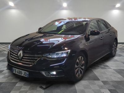 a picture of a black car in a showroom