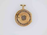 an image of a gold pocket watch on a white surface