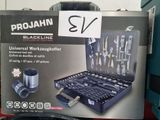 a box of tools sitting on a table in a store