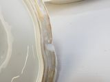 a plate with a piece of cake on it and a plate with a piece of cake on it
