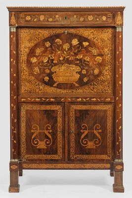 an antique wooden cabinet with a floral design on the door