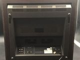 an image of a television set with a remote in it