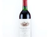 a bottle of wine that is sitting on a table