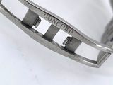 an image of a close up of a watch on a white surface