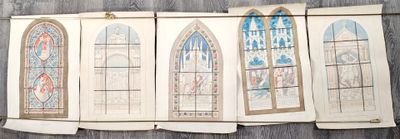 four stained glass windows on the wall of a building