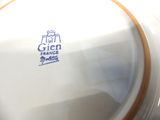 a close up of a plate with a logo on it