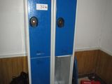 two blue lockers sitting next to each other in a room