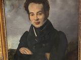 tableau représentant un homme avec une cigarette à la bouche, dans un cadre doré