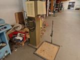 an image of a room with a lot of clutter on the floor