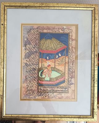 painting of a woman in a boat with a parasol in a gold frame