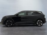 a black suv parked on a concrete floor in a room