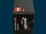 a black box with a lego motorcycle inside of it