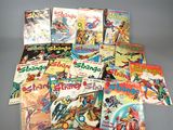 a lot of comic books on the table