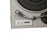 a turntable with a record player attached to it