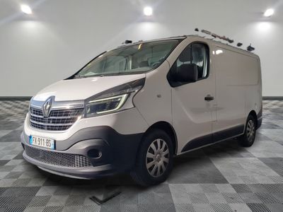 the white van is parked on a checkered floor in a room