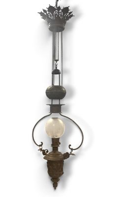 a wall mounted light that is hanging on the wall