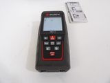 an image of a handheld measuring device sitting on a table