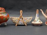 a group of miniature figurines that are on a table