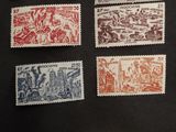 six different stamps with a note attached to them on a black surface