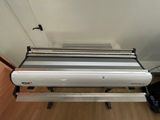 an image of a machine that is sitting on top of a wooden floor