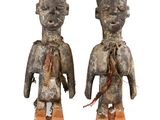pair of african figurines of a man and a woman