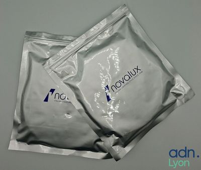 two packets of involux sit on a table next to each other