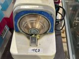 a machine that is sitting on a table in a store