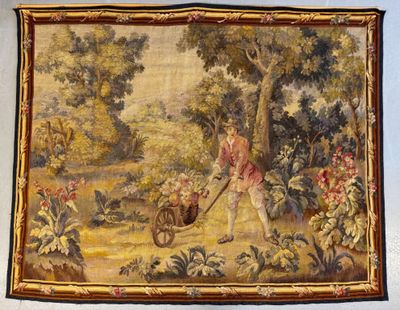tableau représentant une femme tirant une brouette remplie de fleurs dans un jardin