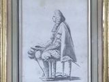 framed drawing of a man sitting on a bench with a dog