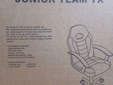 the box for the gaming chair is open and ready to be shipped