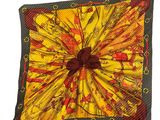 an image of a yellow and red square with a bow on it