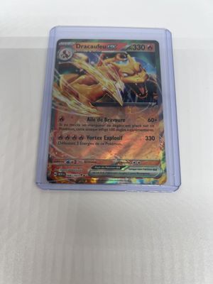 a close up of a pokemon card on a table